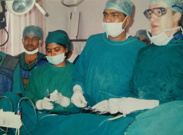 Dr Shantanu Deshpande working with international faculty and the cath lab team