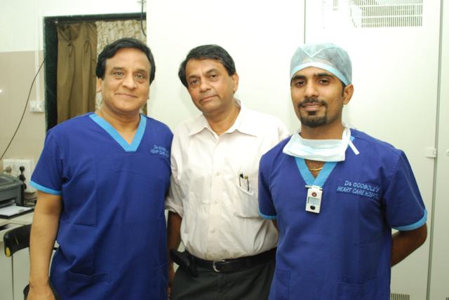 Three colleagues at Dr Godbole's Heart Care Hospital